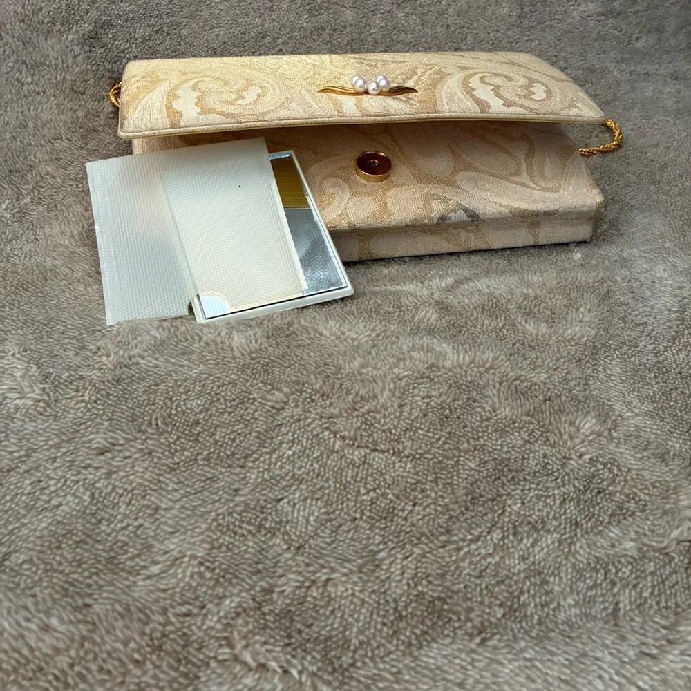 Mikimoto Cream Clutch with Gold Accents